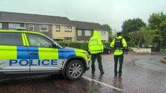 Murder investigation after man found dead and child seriously injured